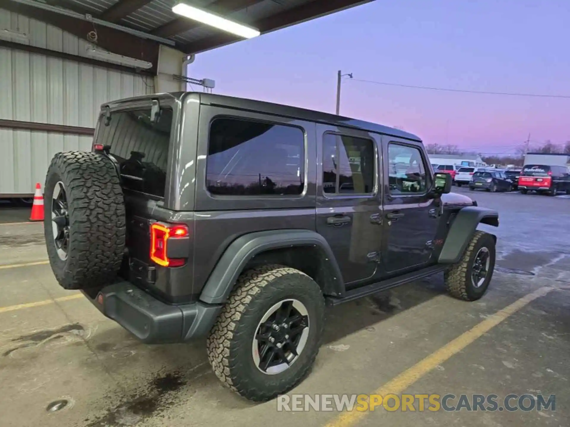 12 Photograph of a damaged car 1C4HJXFNXMW681587 JEEP WRANGLER UNLIMITED 2021