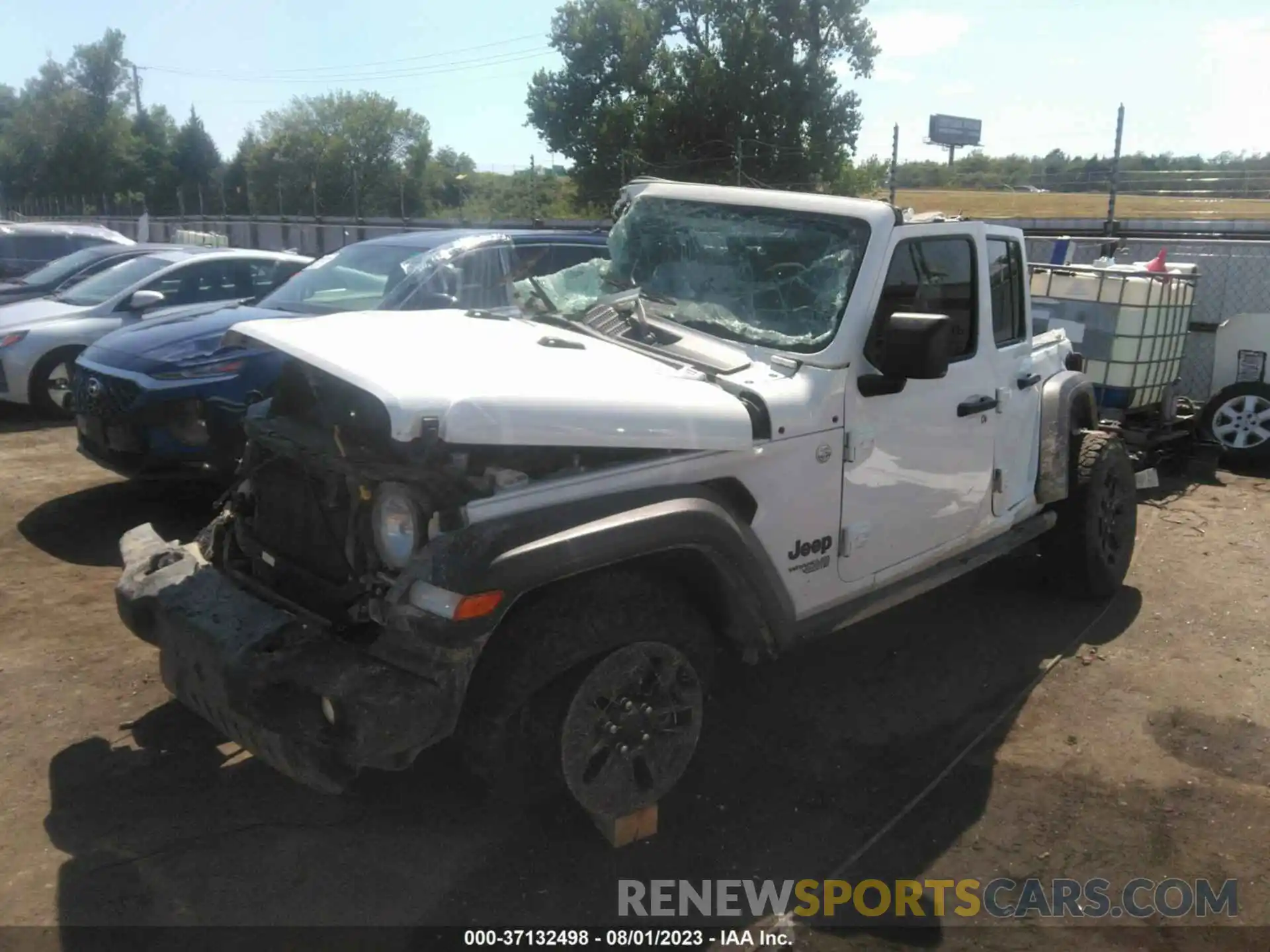 2 Photograph of a damaged car 1C4HJXKNXMW703657 JEEP WRANGLER UNLIMITED 2021