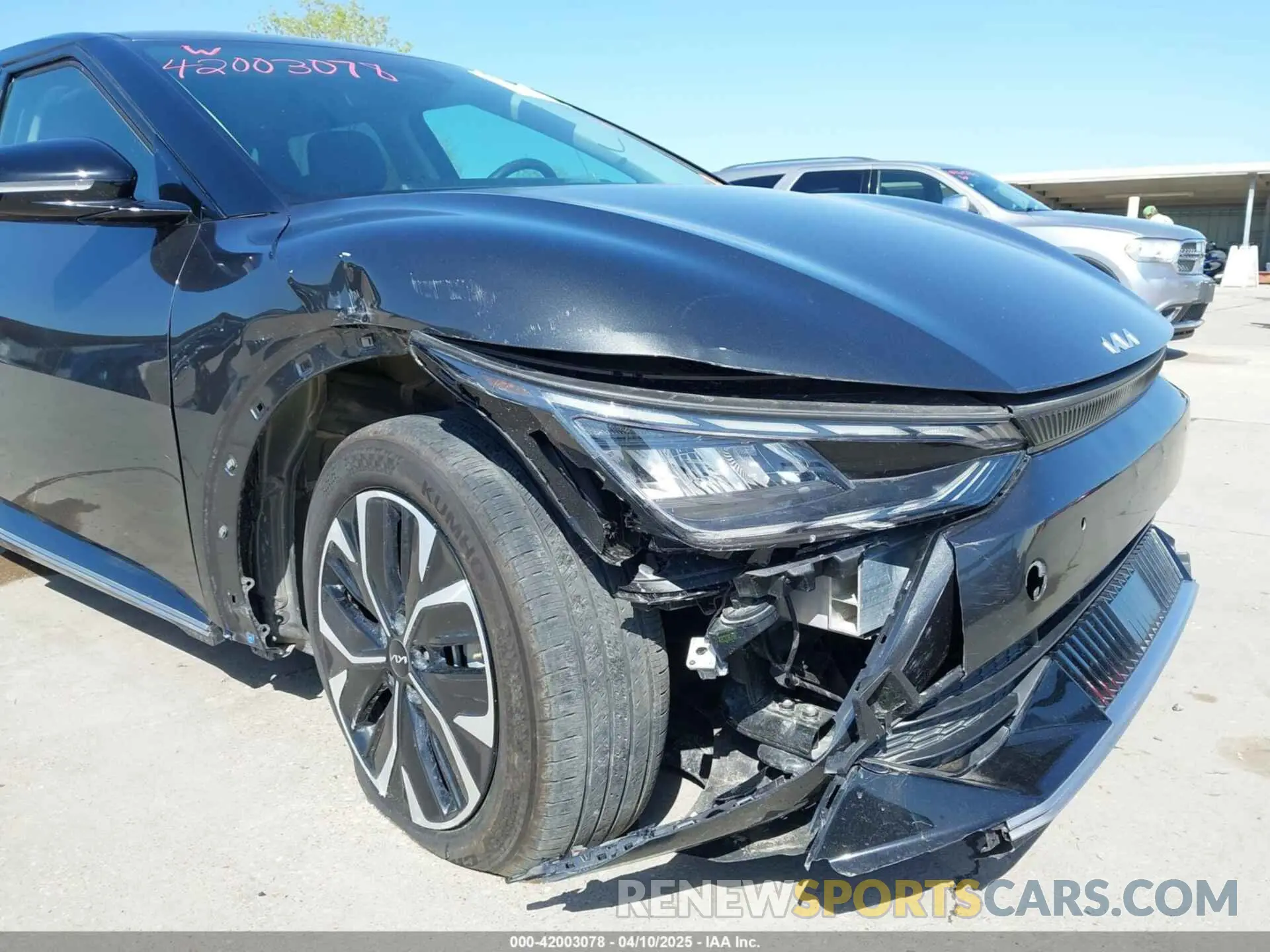 21 Photograph of a damaged car KNDC34LAXP5097236 KIA EV6 2023