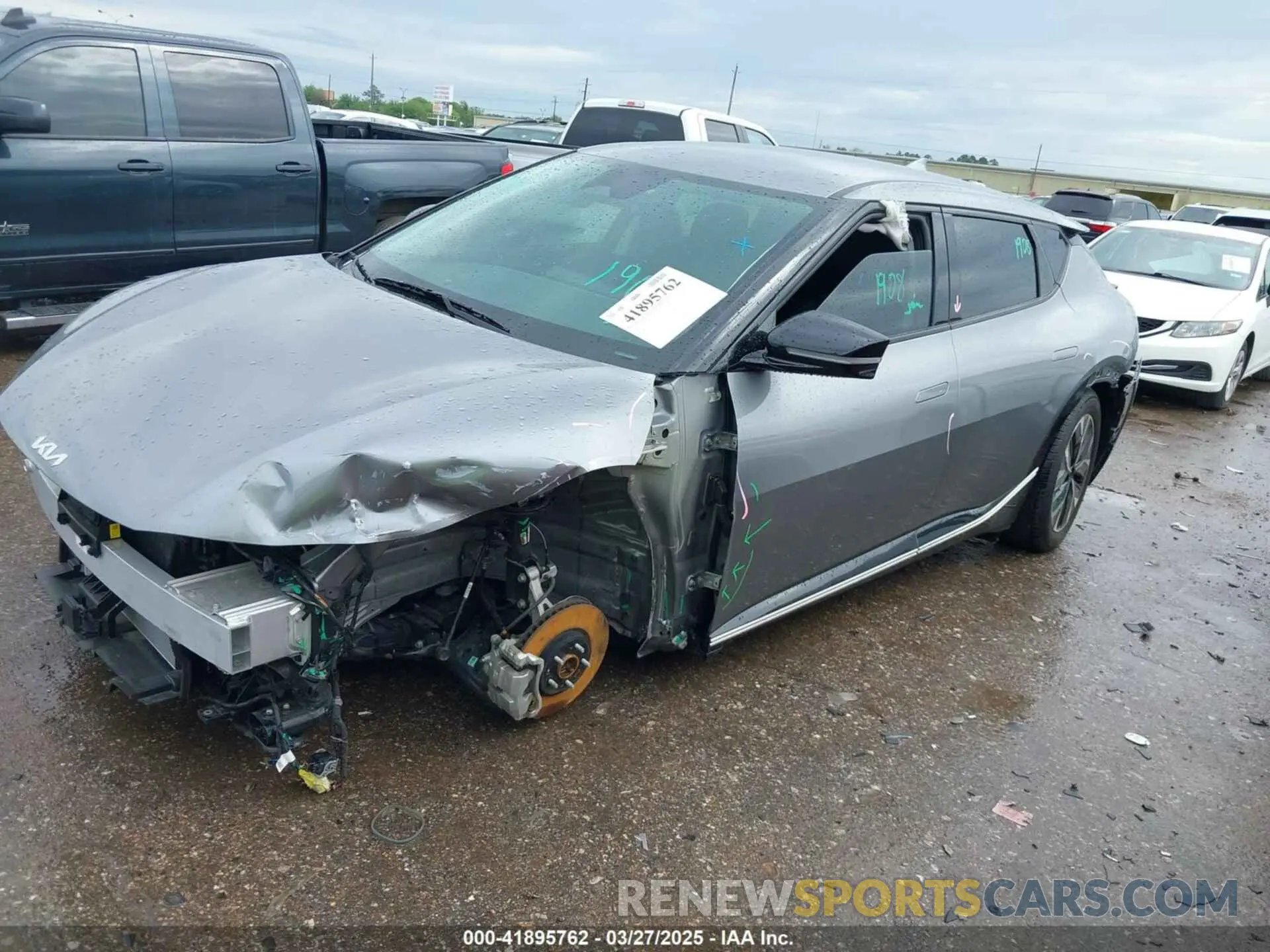 14 Photograph of a damaged car KNDC34LA9R5217482 KIA EV6 2024