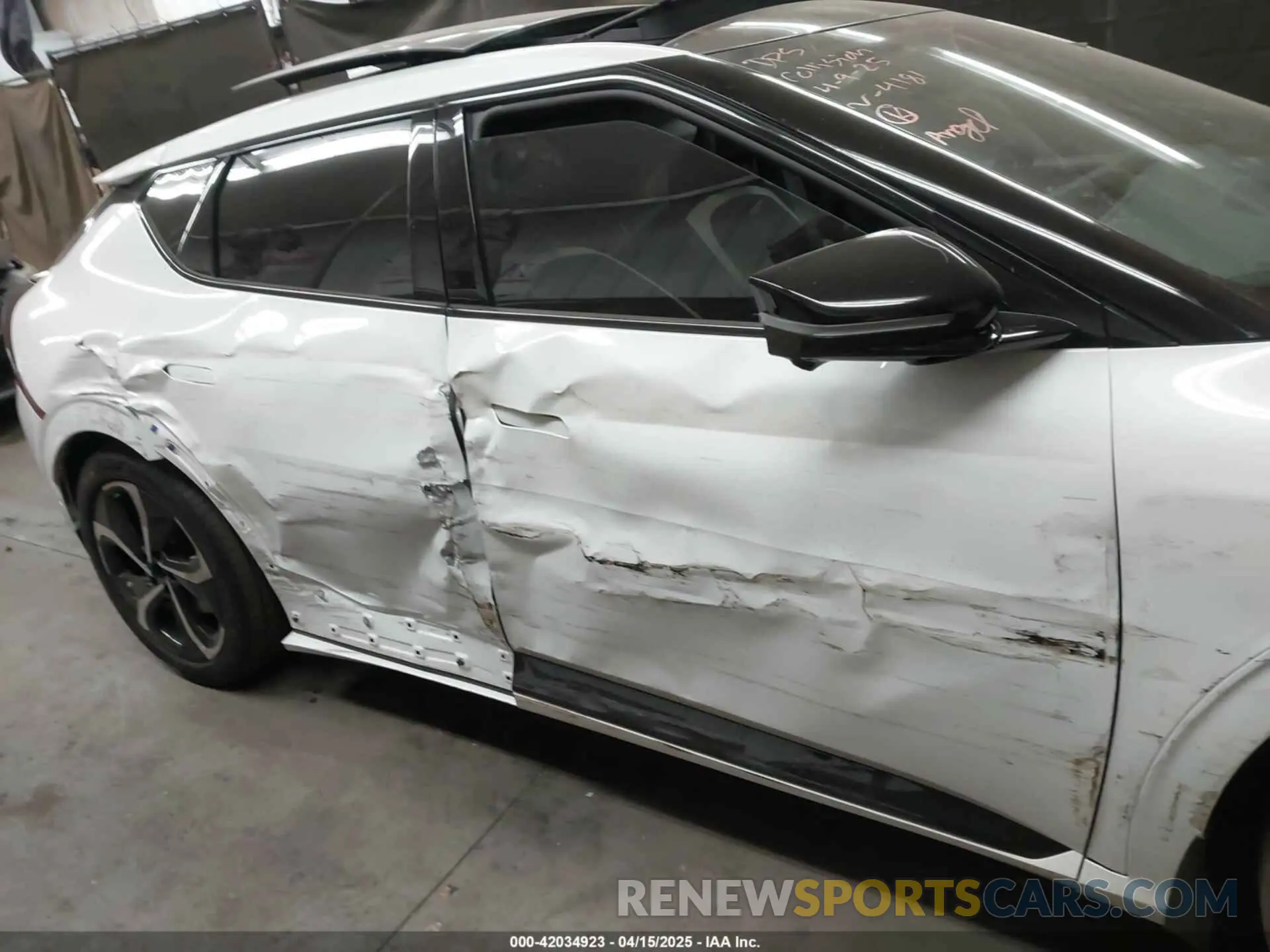 14 Photograph of a damaged car KNDC4DLC9R5204181 KIA EV6 2024