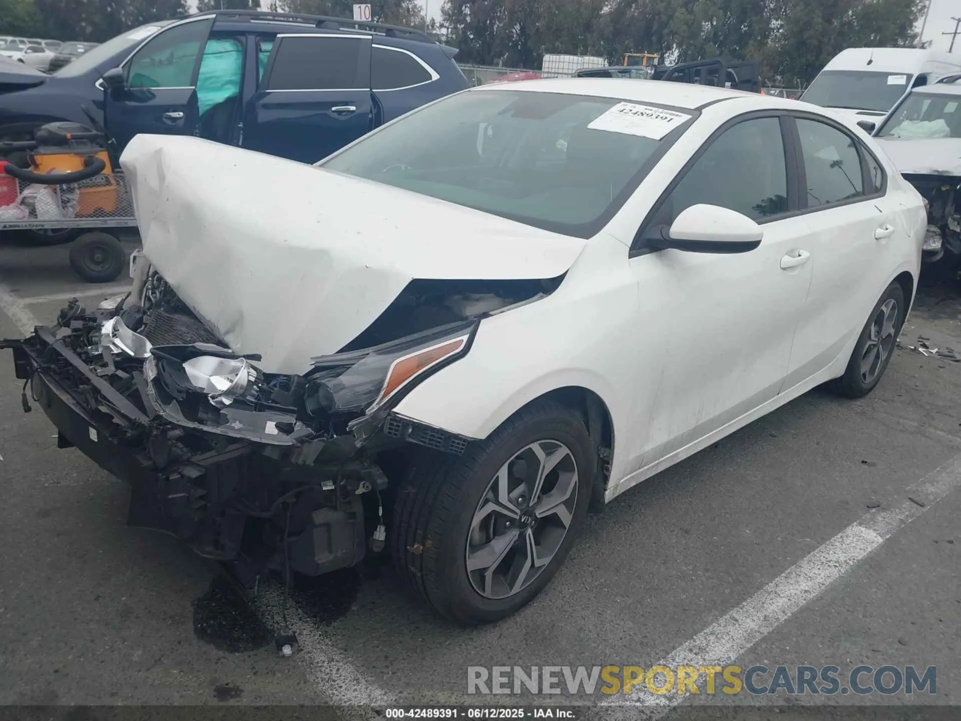 2 Photograph of a damaged car 3KPF24AD2KE114900 KIA FORTE 2019