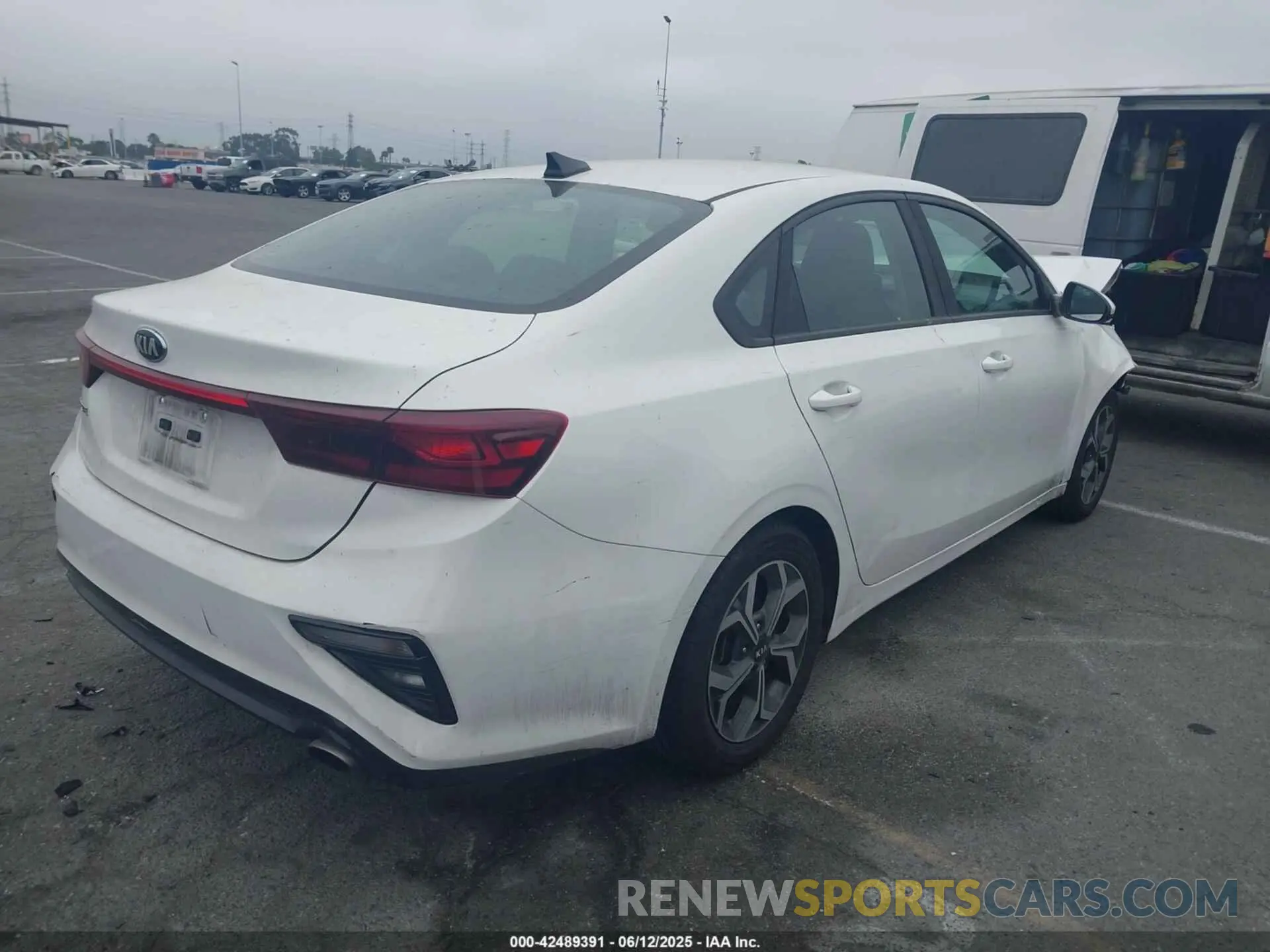 4 Photograph of a damaged car 3KPF24AD2KE114900 KIA FORTE 2019