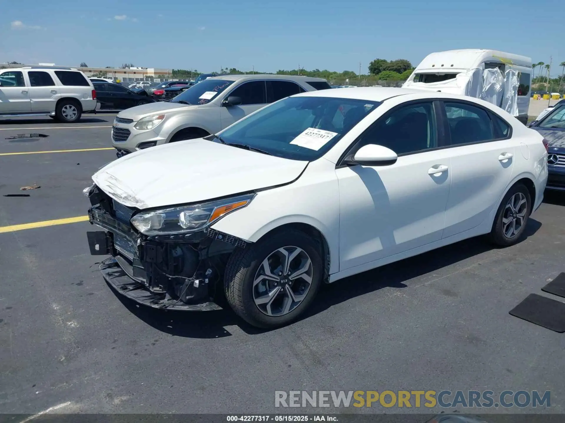 2 Photograph of a damaged car 3KPF24AD5KE107312 KIA FORTE 2019