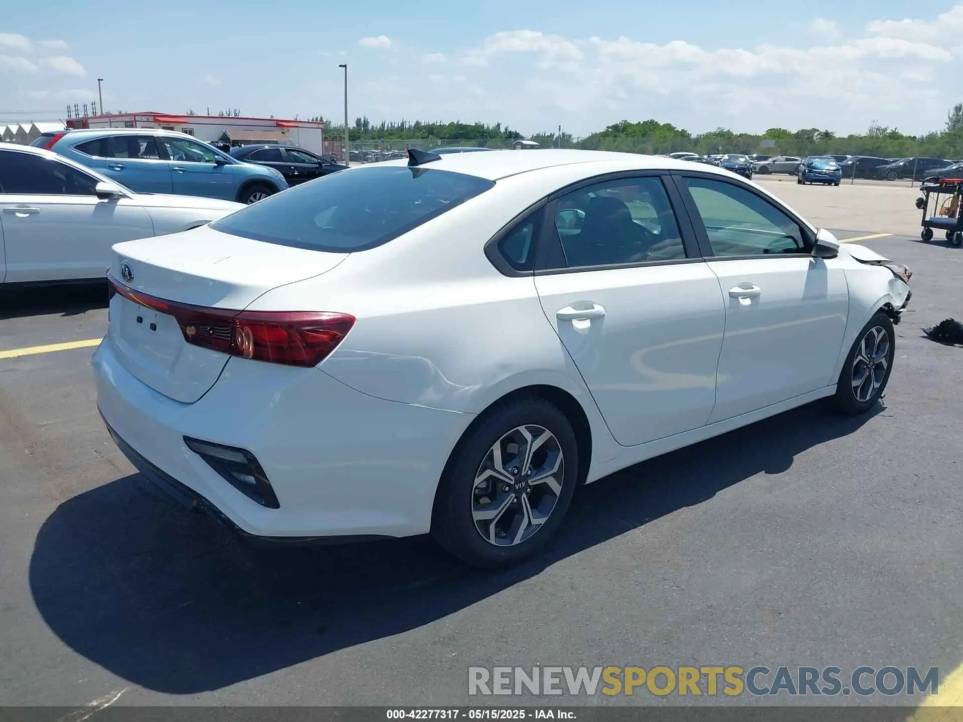 4 Photograph of a damaged car 3KPF24AD5KE107312 KIA FORTE 2019