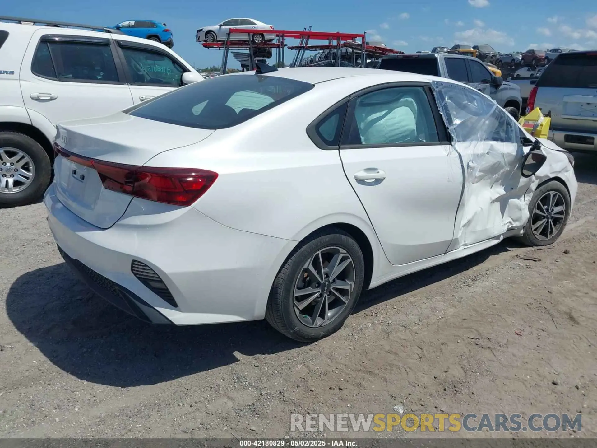 4 Photograph of a damaged car 3KPF24AD3NE499971 KIA FORTE 2022