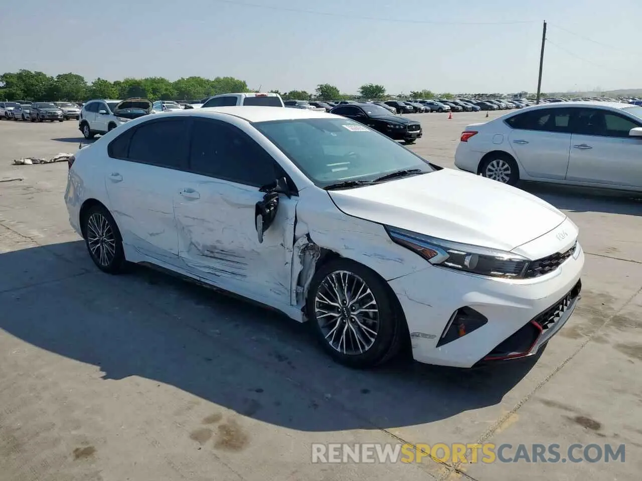 4 Photograph of a damaged car 3KPF54AD3NE432780 KIA FORTE 2022