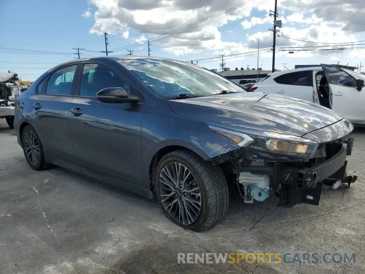 4 Photograph of a damaged car 3KPF54AD5NE490597 KIA FORTE 2022