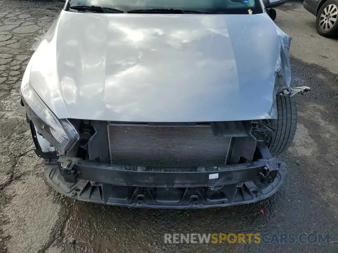 11 Photograph of a damaged car 3KPF24AD1PE572936 KIA FORTE 2023