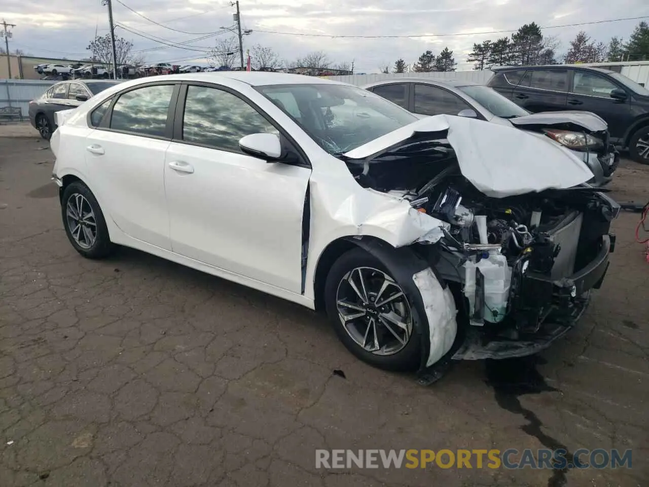 4 Photograph of a damaged car 3KPF24AD2PE594346 KIA FORTE 2023