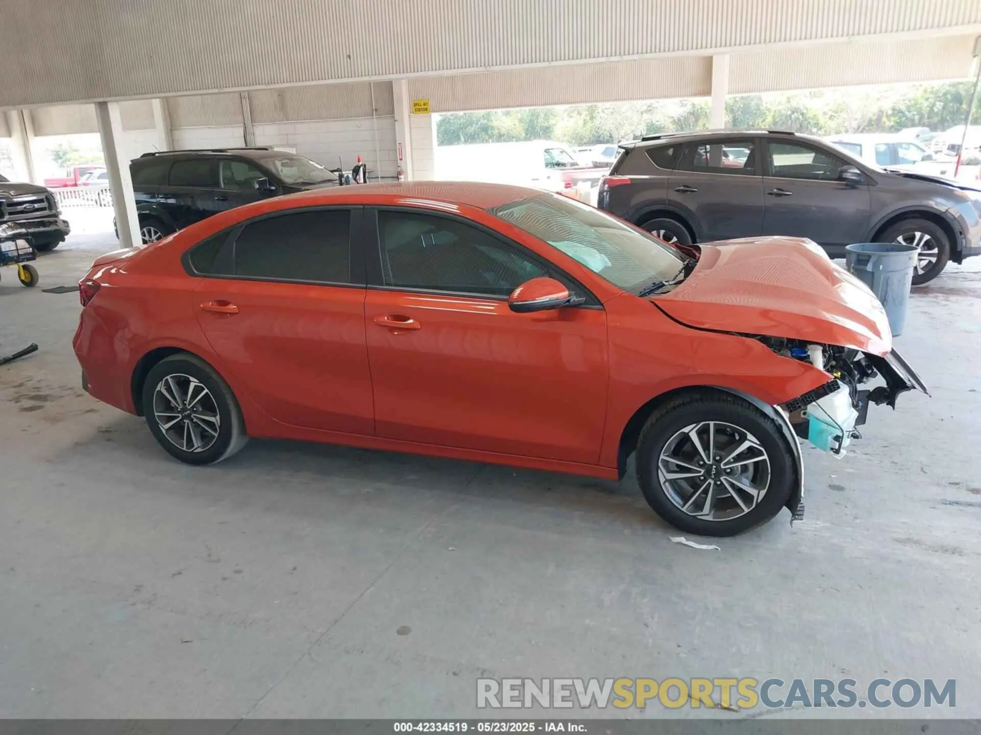 13 Photograph of a damaged car 3KPF24AD5PE677558 KIA FORTE 2023