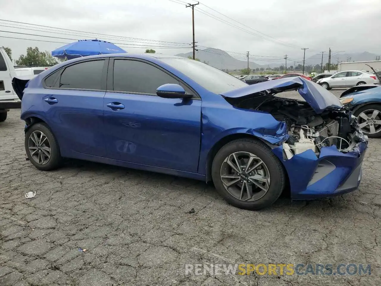 4 Photograph of a damaged car 3KPF24AD6PE562094 KIA FORTE 2023