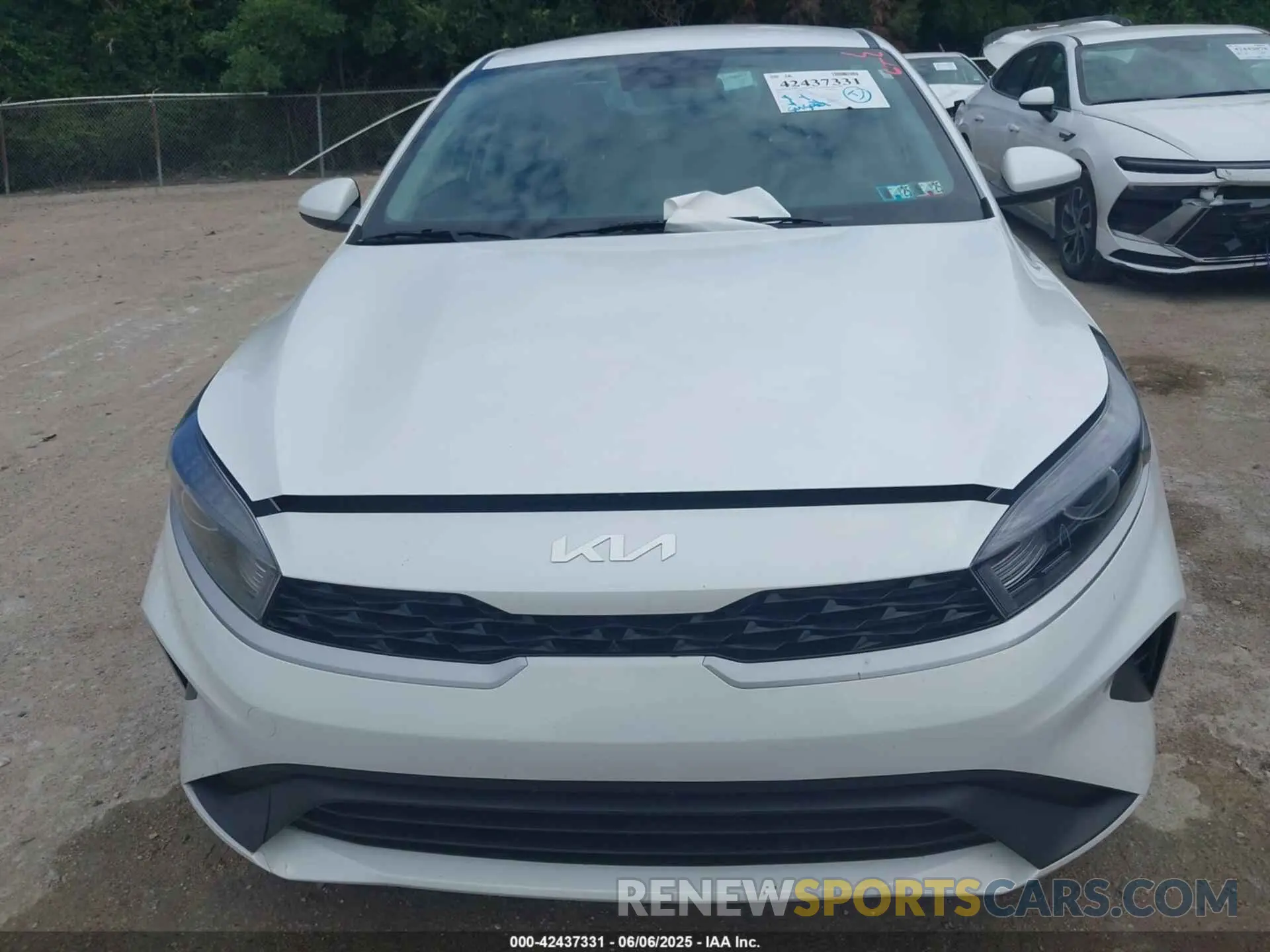 12 Photograph of a damaged car 3KPF24AD6PE585357 KIA FORTE 2023