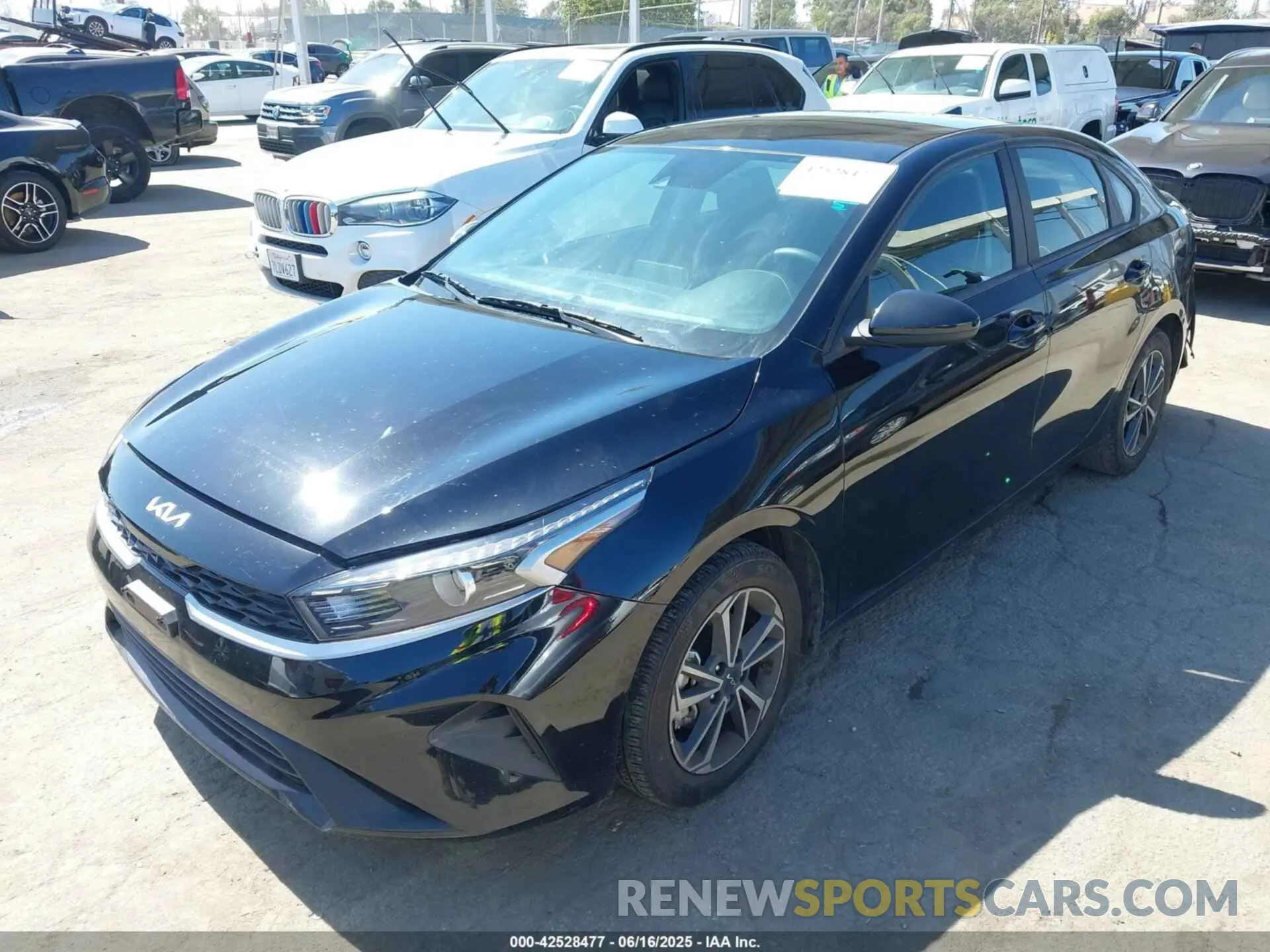 2 Photograph of a damaged car 3KPF24AD6PE652345 KIA FORTE 2023