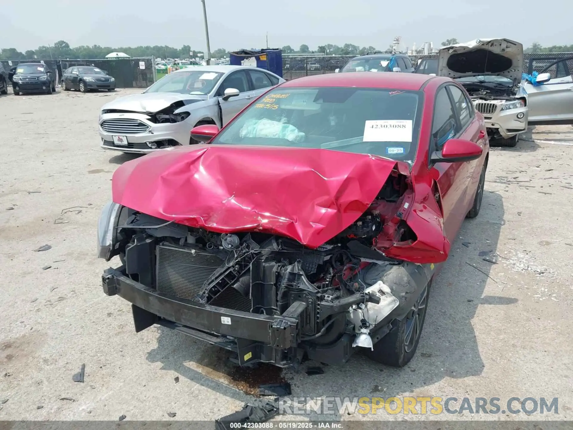 2 Photograph of a damaged car 3KPF24AD6PE682252 KIA FORTE 2023