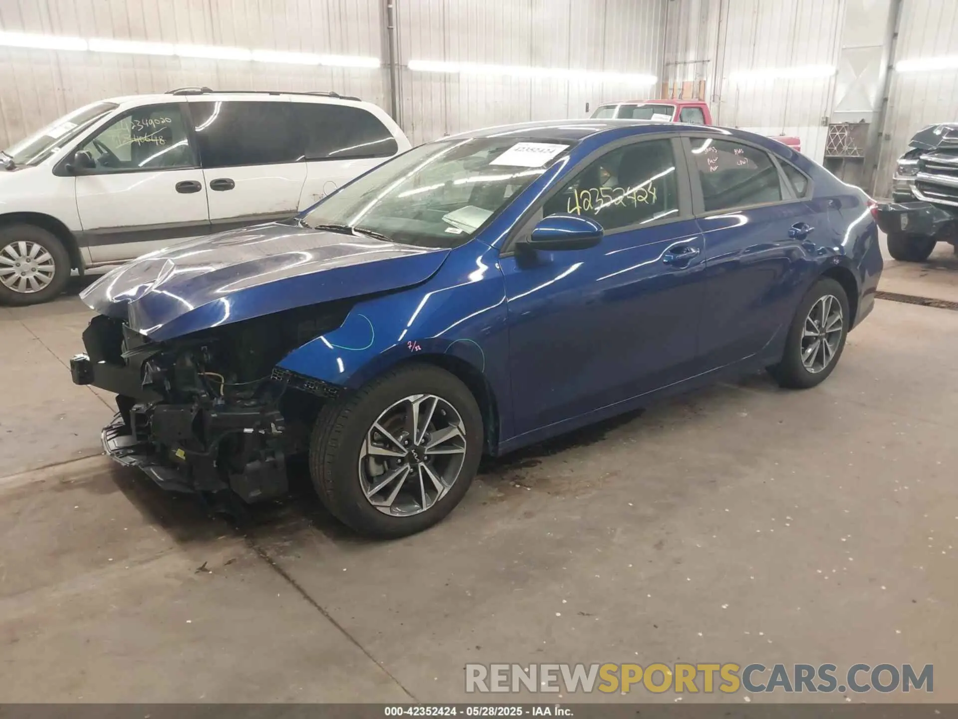 2 Photograph of a damaged car 3KPF24AD7PE569555 KIA FORTE 2023