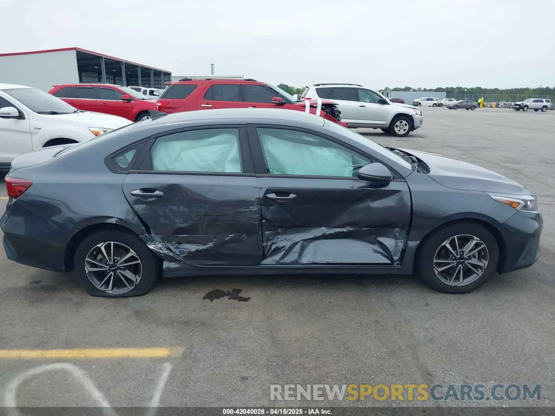 13 Photograph of a damaged car 3KPF24AD7PE690487 KIA FORTE 2023