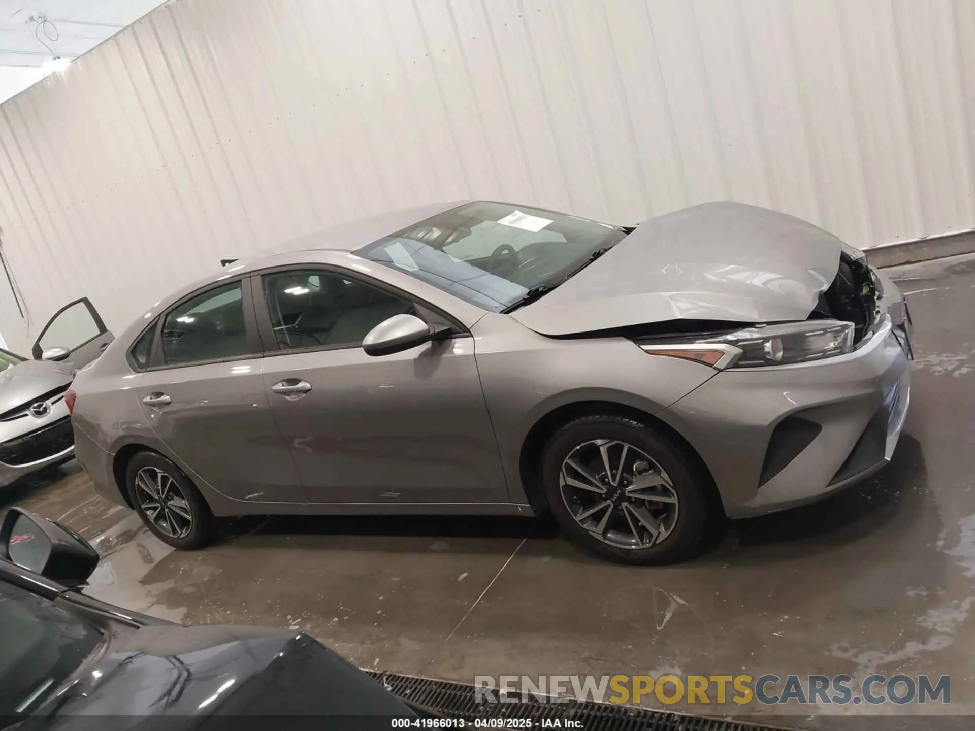 14 Photograph of a damaged car 3KPF24AD9PE599897 KIA FORTE 2023