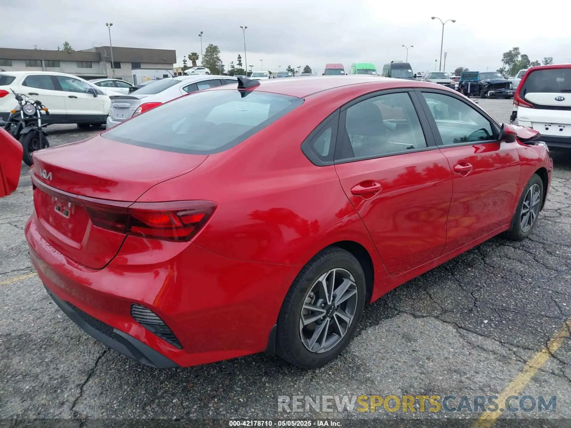 4 Photograph of a damaged car 3KPF24AD9PE682410 KIA FORTE 2023
