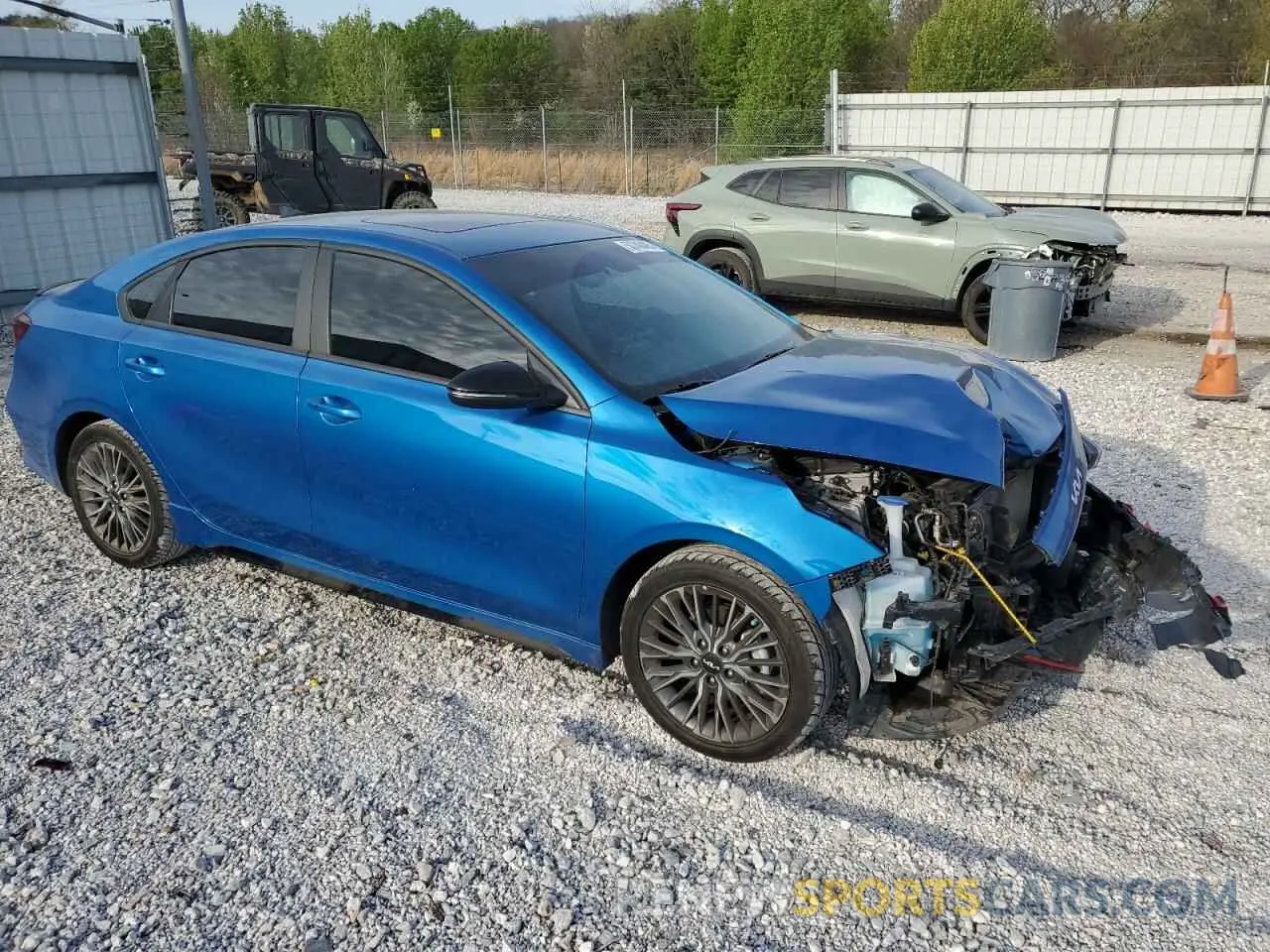 4 Photograph of a damaged car 3KPF54AD0PE670959 KIA FORTE 2023