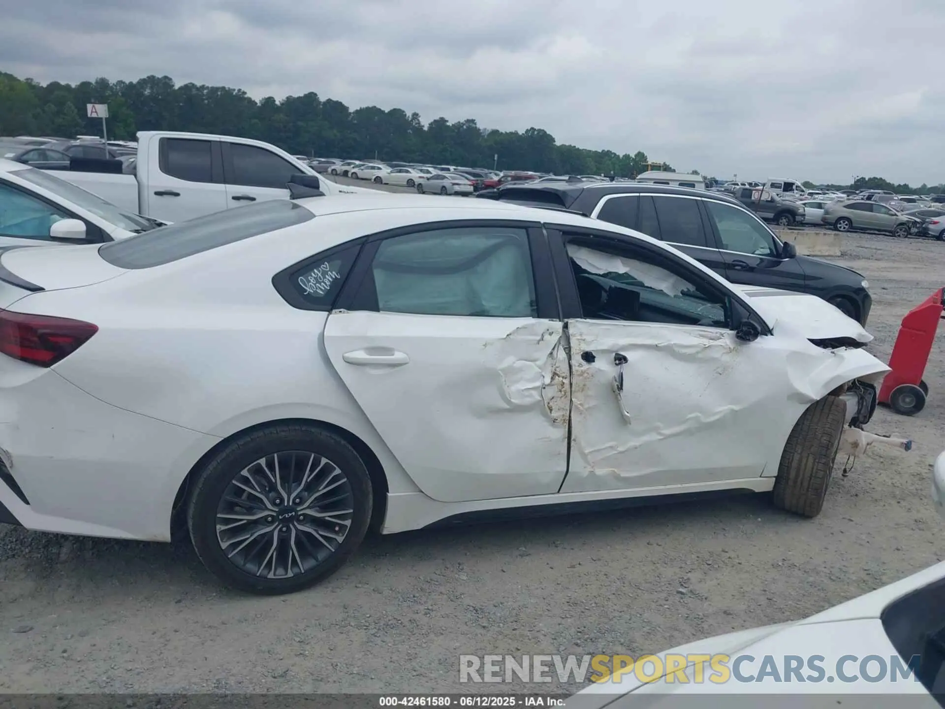 12 Photograph of a damaged car 3KPF54AD2PE583712 KIA FORTE 2023