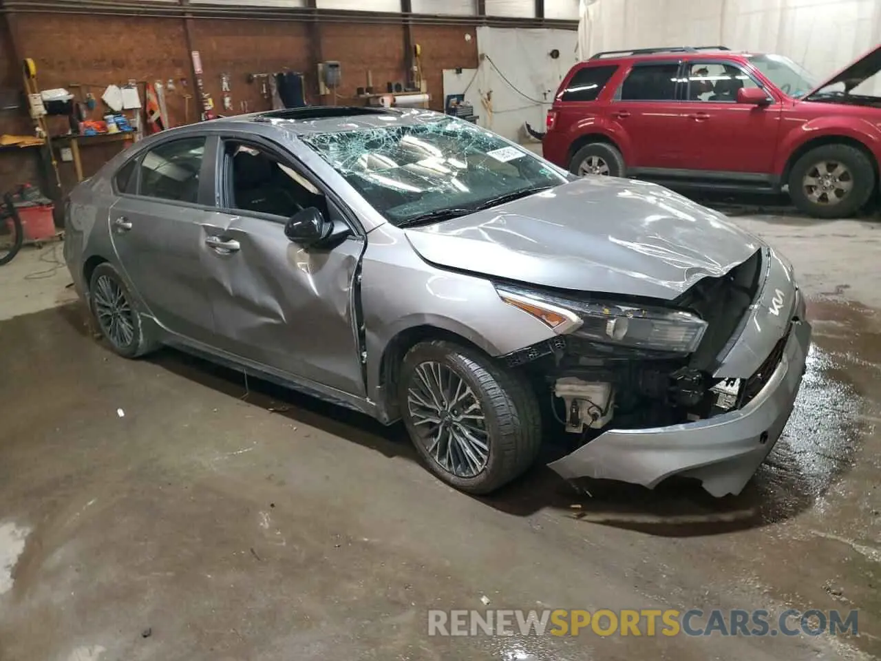 4 Photograph of a damaged car 3KPF54AD2PE671823 KIA FORTE 2023