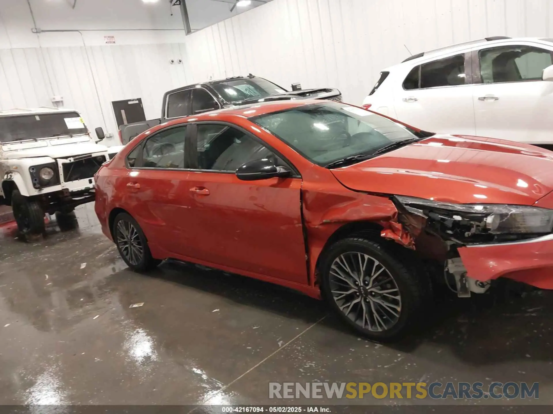 13 Photograph of a damaged car 3KPF54AD4PE599104 KIA FORTE 2023