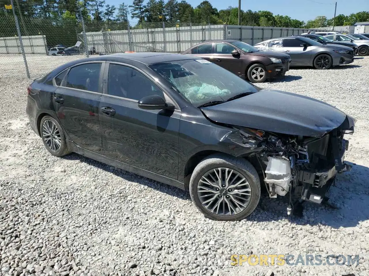 4 Photograph of a damaged car 3KPF54AD4PE670494 KIA FORTE 2023