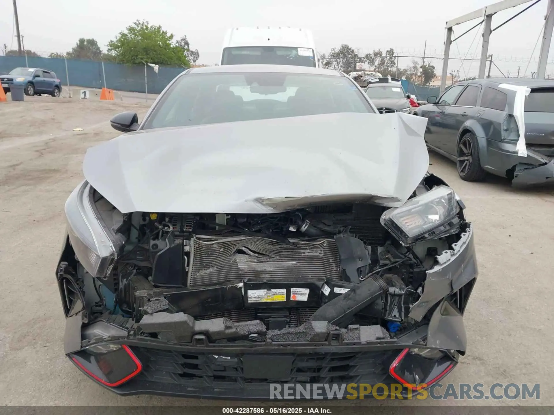 13 Photograph of a damaged car 3KPF54AD5PE577659 KIA FORTE 2023