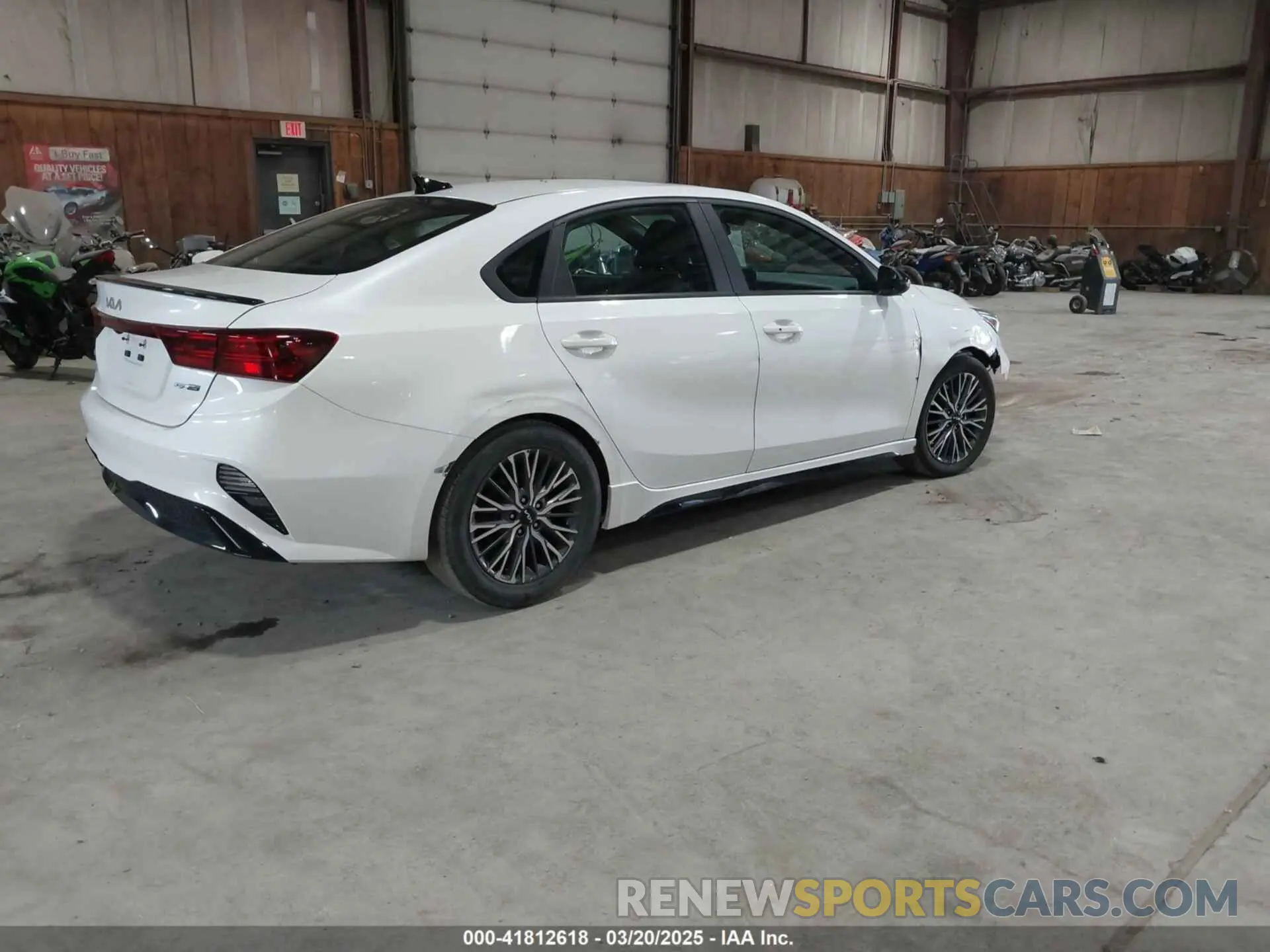 4 Photograph of a damaged car 3KPF54AD6PE522217 KIA FORTE 2023