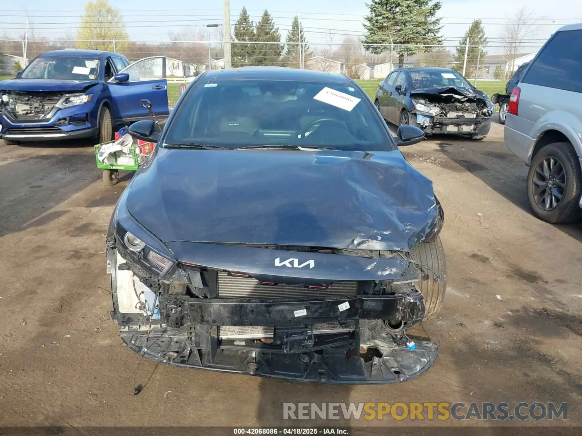 12 Photograph of a damaged car 3KPF54AD6PE577461 KIA FORTE 2023