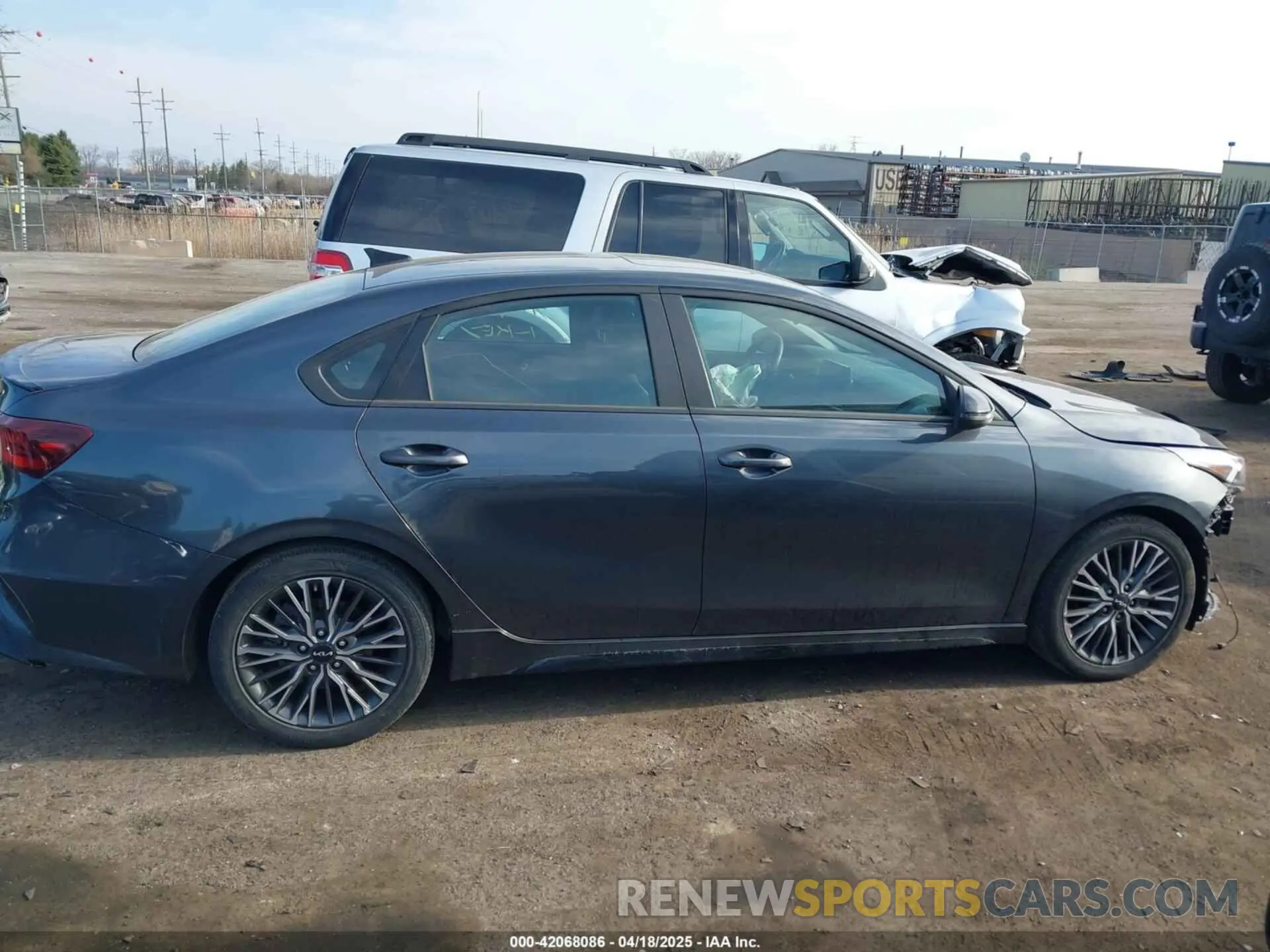 13 Photograph of a damaged car 3KPF54AD6PE577461 KIA FORTE 2023