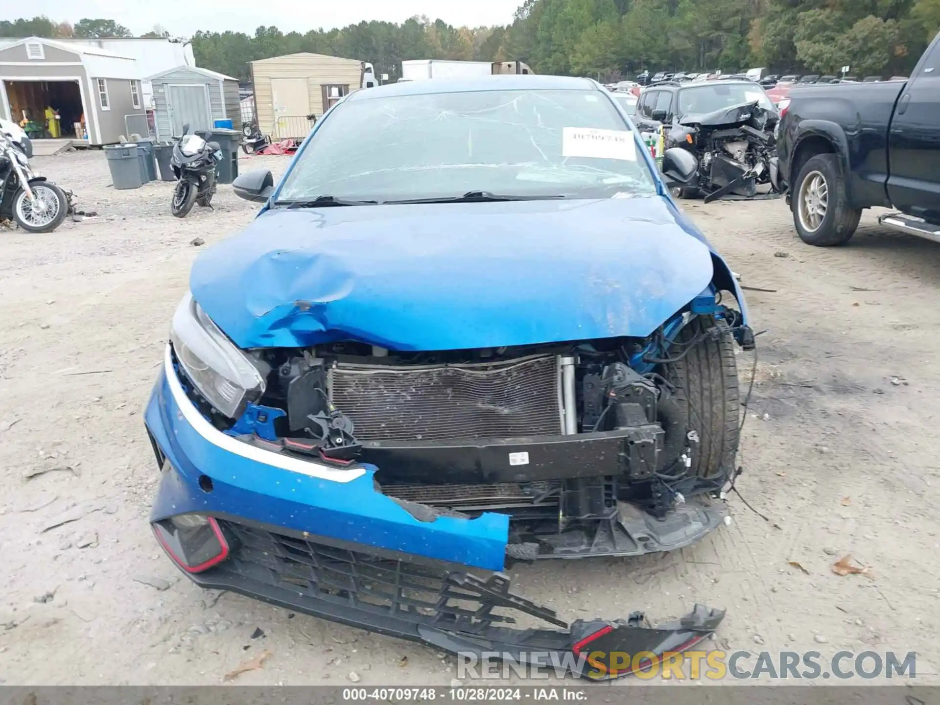 12 Photograph of a damaged car 3KPF54AD7PE587304 KIA FORTE 2023