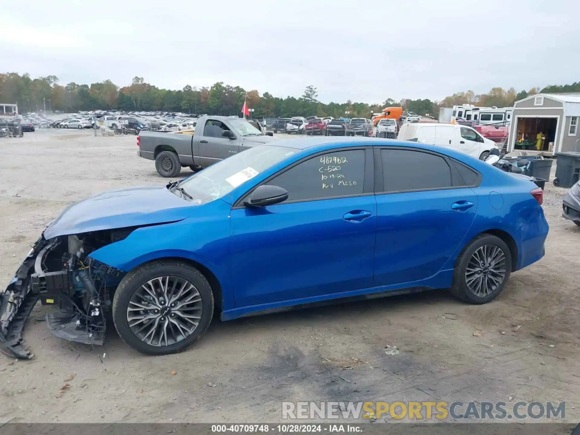 14 Photograph of a damaged car 3KPF54AD7PE587304 KIA FORTE 2023