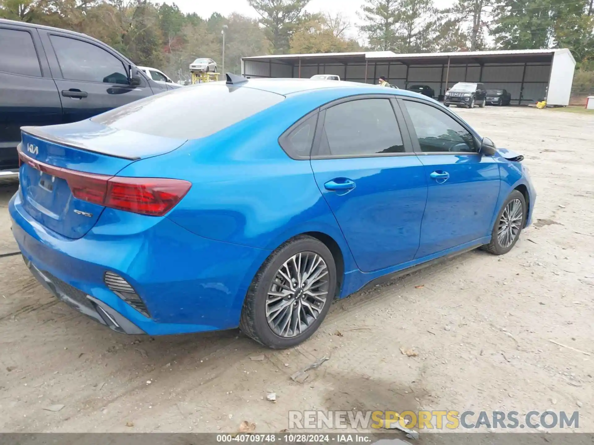 4 Photograph of a damaged car 3KPF54AD7PE587304 KIA FORTE 2023