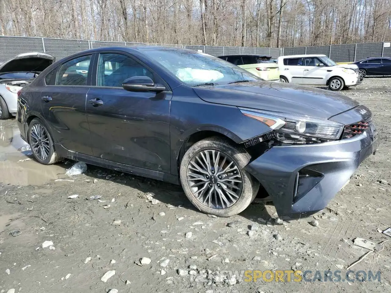 4 Photograph of a damaged car 3KPF54AD7PE600908 KIA FORTE 2023