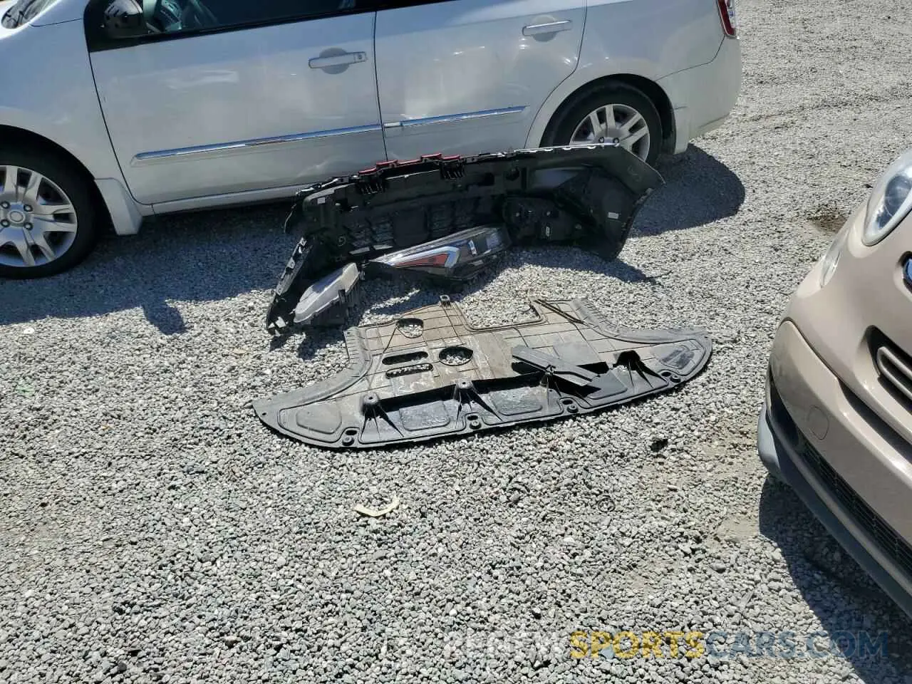 12 Photograph of a damaged car 3KPF54AD8PE604384 KIA FORTE 2023