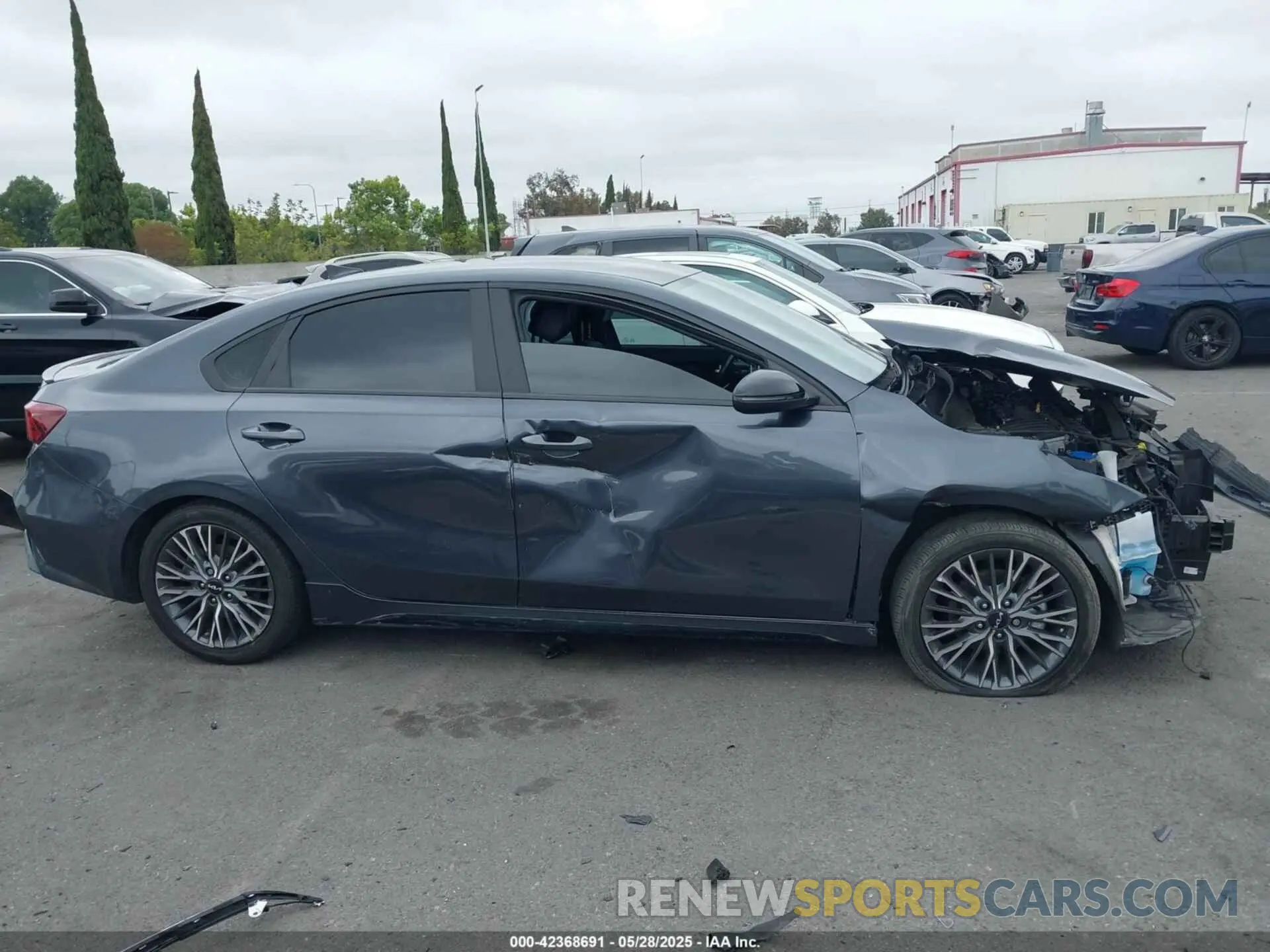 14 Photograph of a damaged car 3KPF54ADXPE613202 KIA FORTE 2023