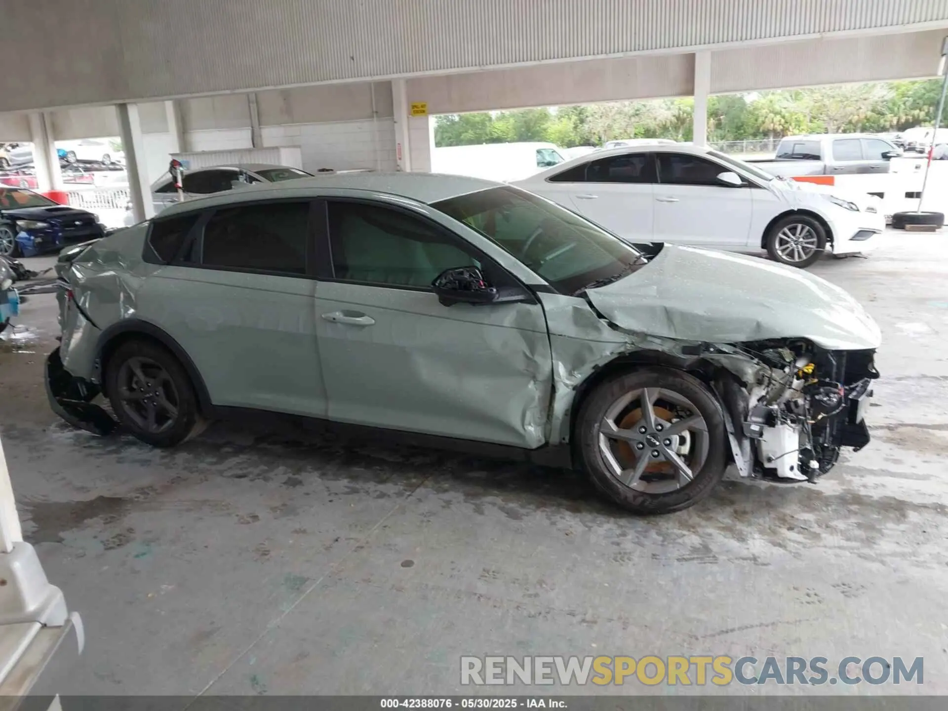 13 Photograph of a damaged car 3KPFT4DE2SE083794 KIA K4 2025