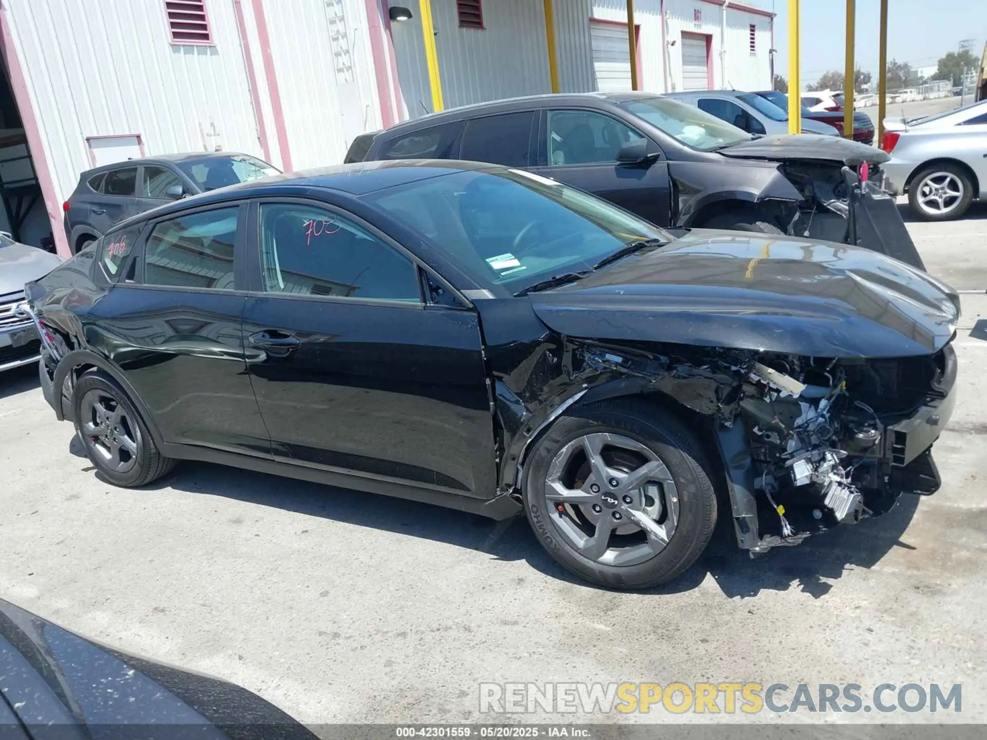 14 Photograph of a damaged car 3KPFT4DEXSE095871 KIA K4 2025