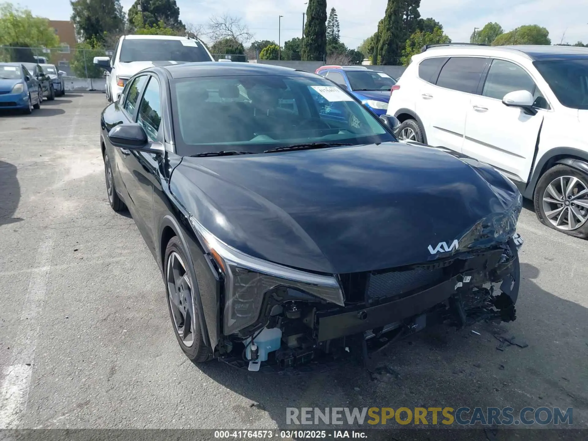 1 Photograph of a damaged car 3KPFU4DE5SE033811 KIA K4 2025
