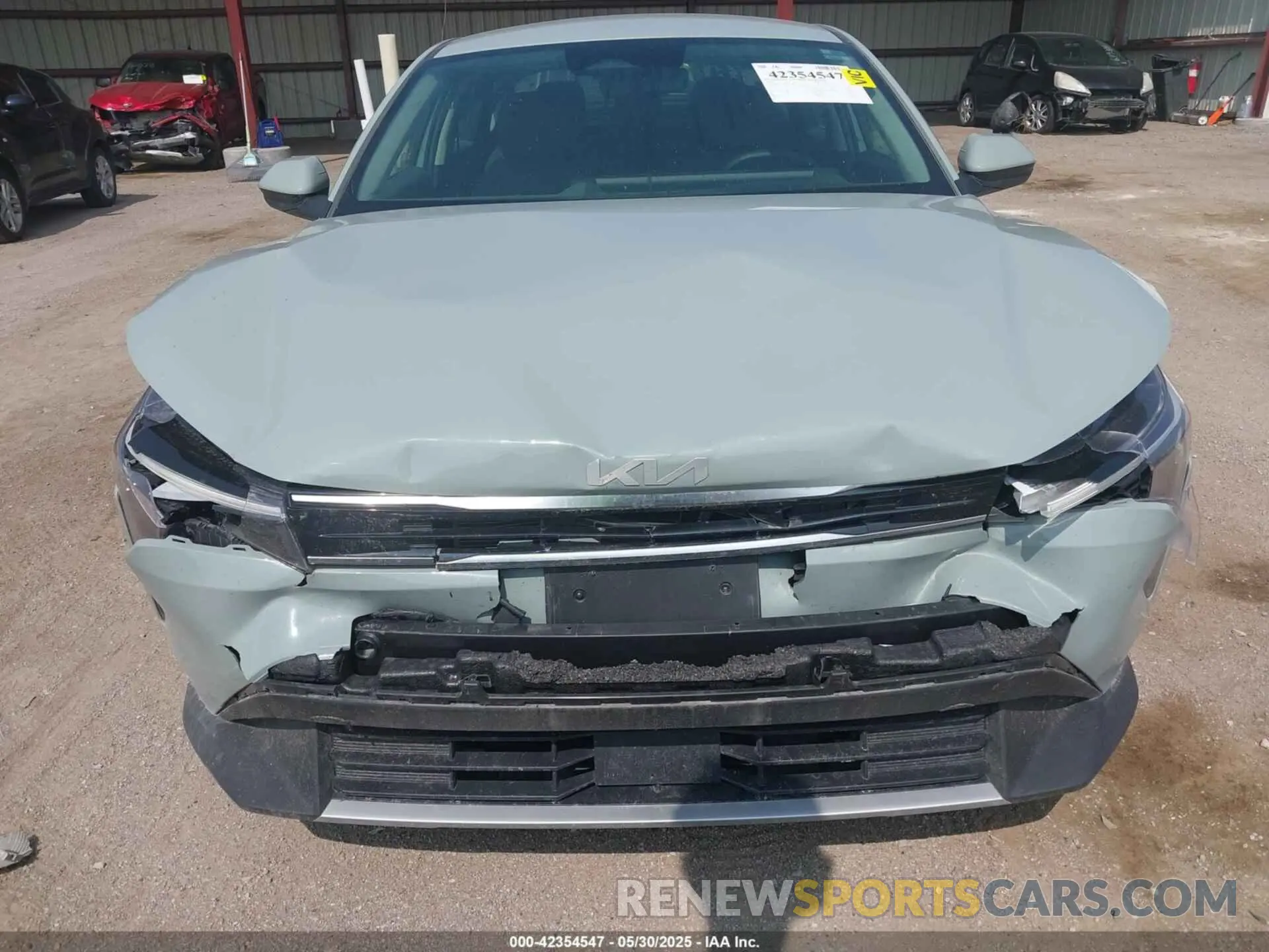 12 Photograph of a damaged car 3KPFU4DE7SE085084 KIA K4 2025