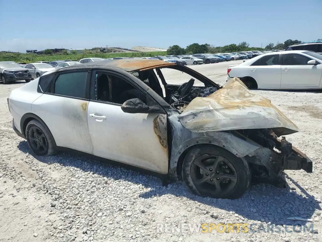 4 Photograph of a damaged car 3KPFT4DE3SE062971 KIA K4 LX 2025