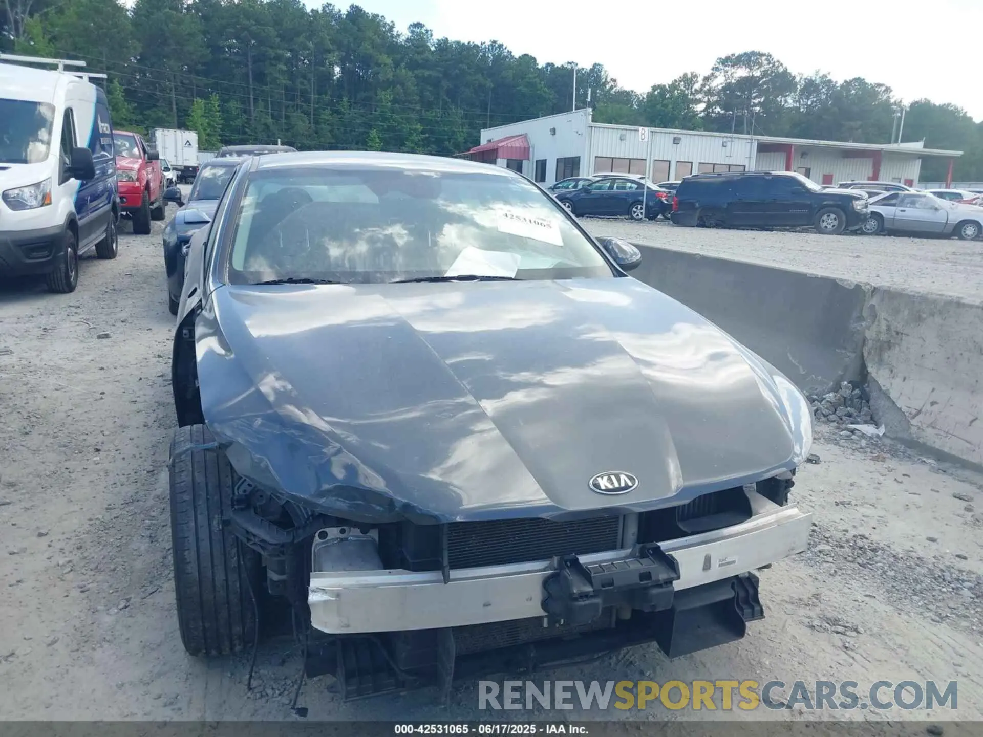 12 Photograph of a damaged car 5XXG14J21MG065740 KIA K5 2021