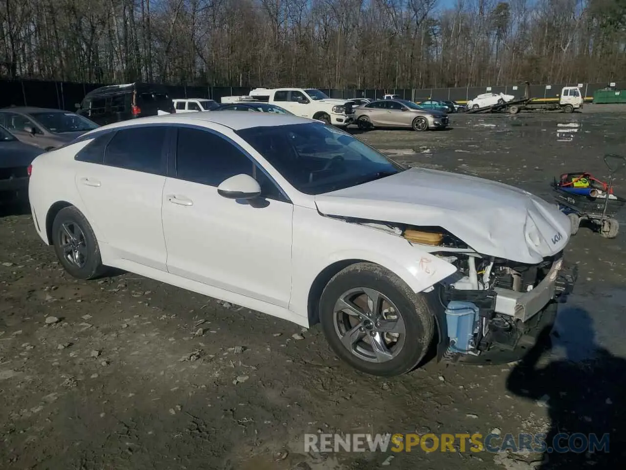 4 Photograph of a damaged car 5XXG14J20NG125086 KIA K5 2022