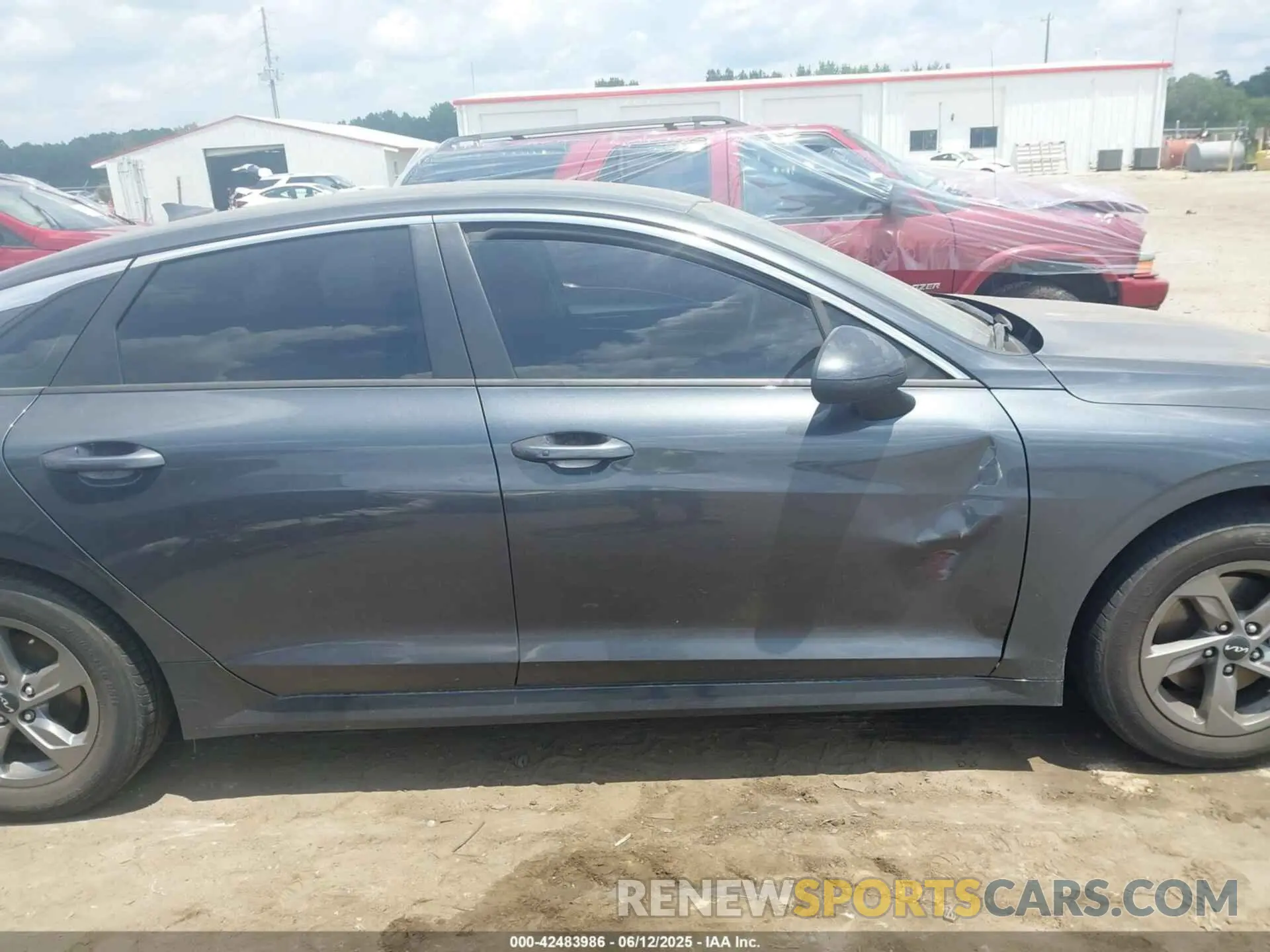 13 Photograph of a damaged car 5XXG14J20NG142776 KIA K5 2022