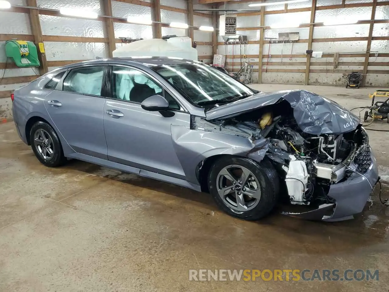 4 Photograph of a damaged car 5XXG14J22NG132184 KIA K5 2022
