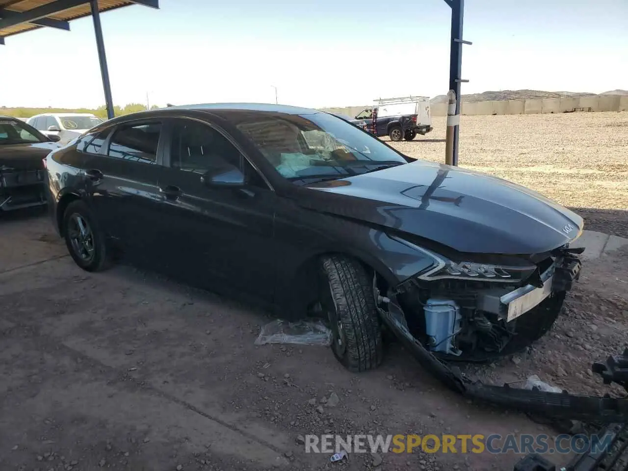 4 Photograph of a damaged car 5XXG14J23NG122862 KIA K5 2022
