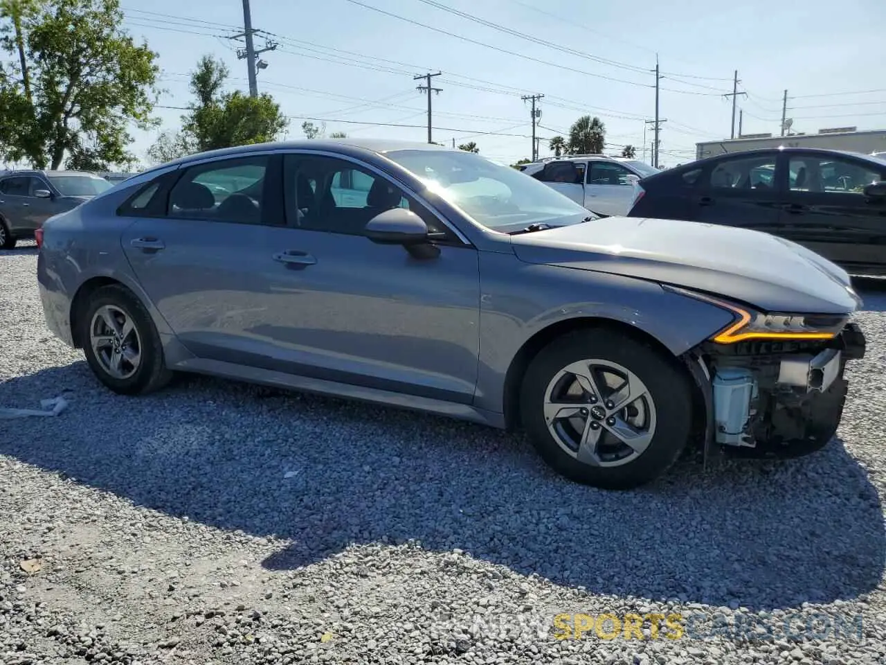 4 Photograph of a damaged car 5XXG14J24NG132171 KIA K5 2022
