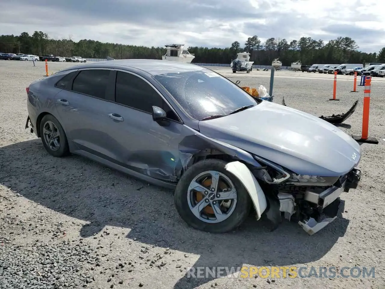 4 Photograph of a damaged car 5XXG14J24NG132185 KIA K5 2022